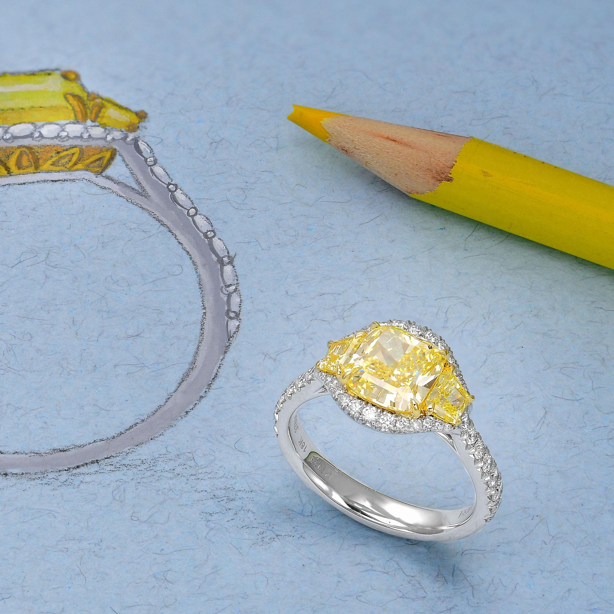 Taille coussin 2.07 cts Certified Fancy Yellow Cushion Three-stone Halo Diamond Ring (bague à trois pierres) en vente
