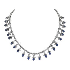 Collier en or blanc 18 carats avec un saphir de 20,70 carats et un diamant de 4,00 carats