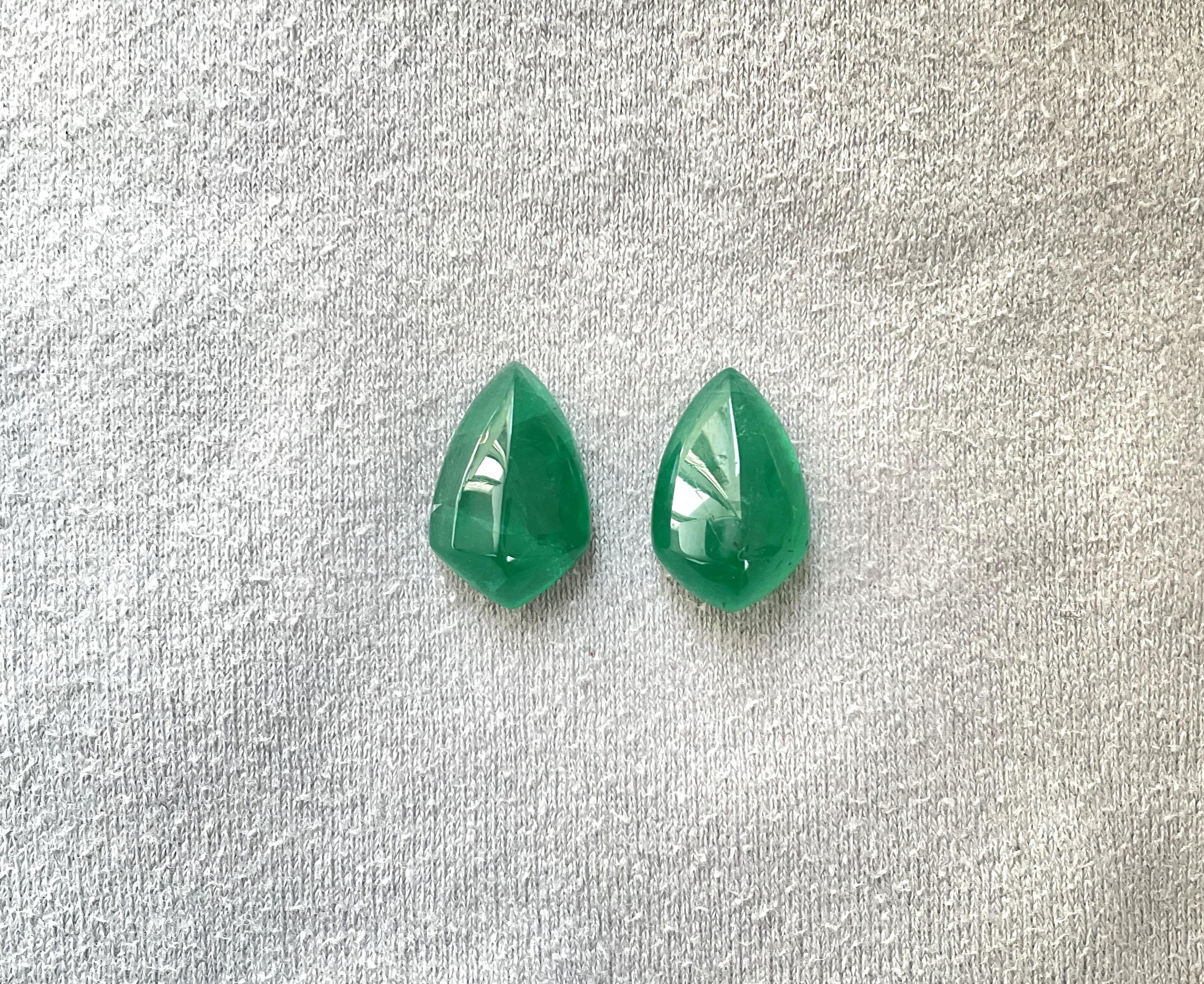 20.71 carats Zambian Emerald Shield Pair cabochon stone for fine Jewelry Natural Gem
Weight: 20.71 Carats
Size: 19x12x8 MM
Pieces: 2
Shape: Shield