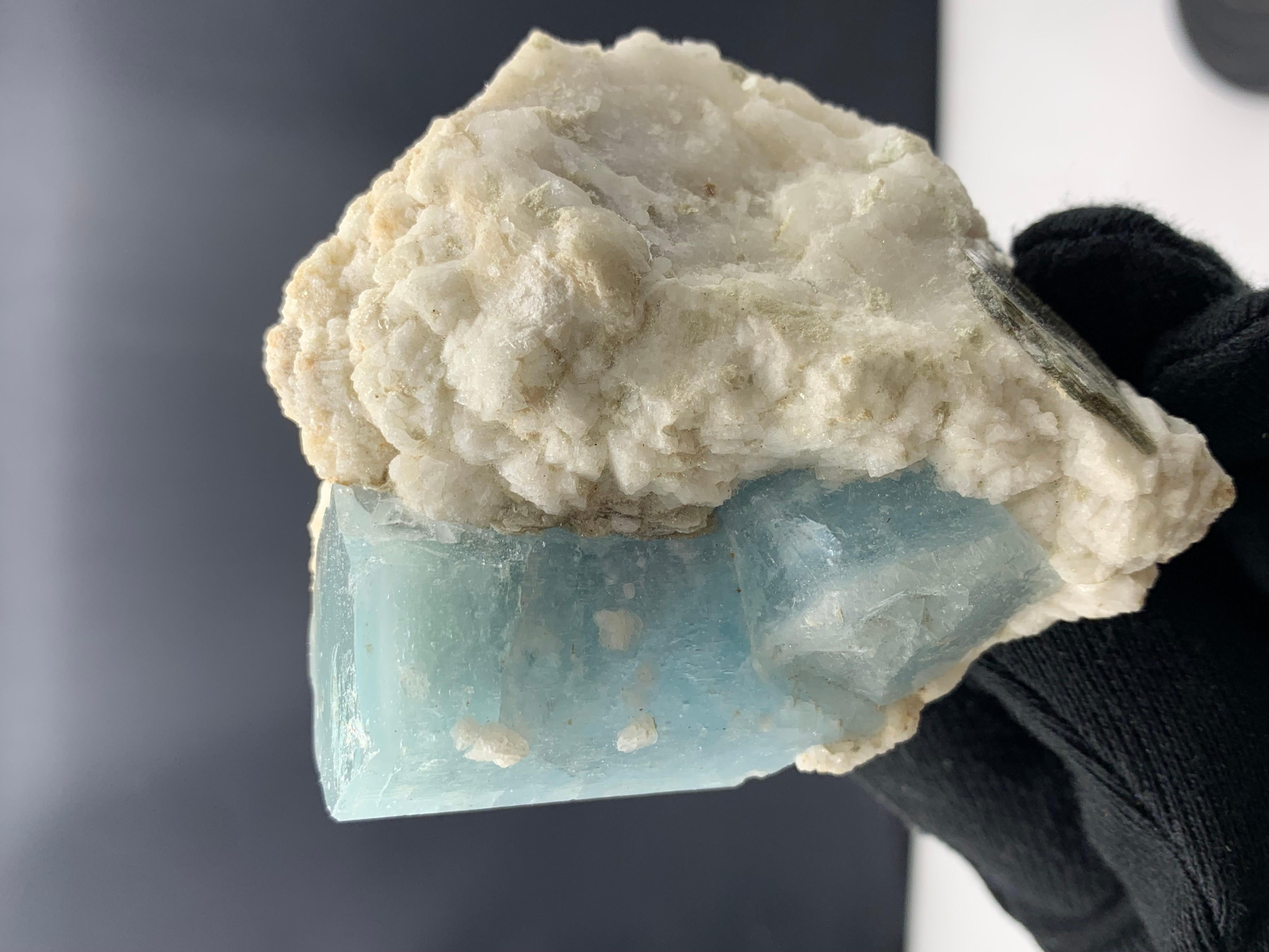 Weight: 207.32 Gram
Dimension: 8.2 x 6.7 x 3.2 Cm
Origin: Afghanistan 

Aquamarine is a pale-blue to light-green variety of beryl. The color of aquamarine can be changed by heat. Aquamarine has a chemical composition of Be₃Al₂Si₆O₁₈, also containing