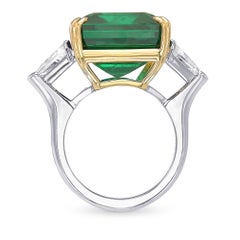 20.78 cts Certified Vivid Green Octagon Emerald Three-stone Diamond Ring