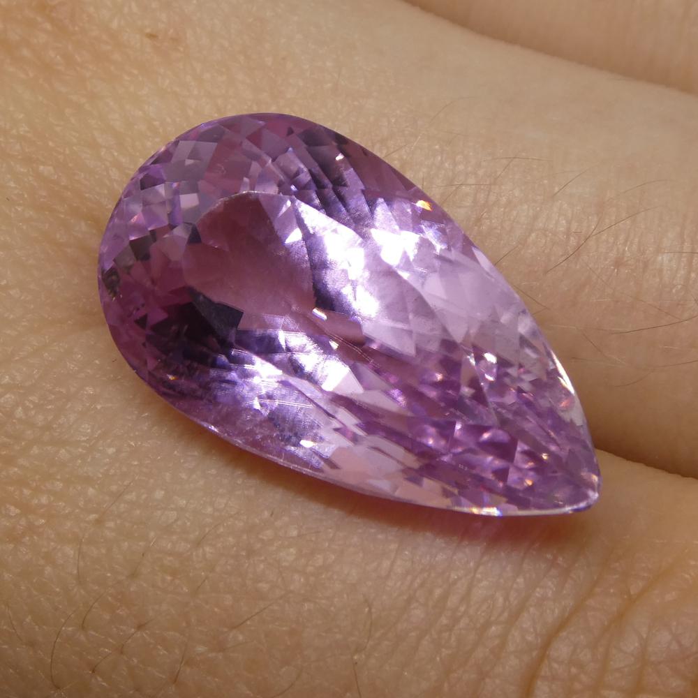 Description:

Gem Type: Kunzite
Number of Stones: 1
Weight: 20.79 cts
Measurements: 22.90x12.90x10.90mm
Shape: Pear
Cutting Style Crown: Modified Brilliant Cut
Cutting Style Pavilion: Mixed Cut
Transparency: Transparent
Clarity: Very Slightly
