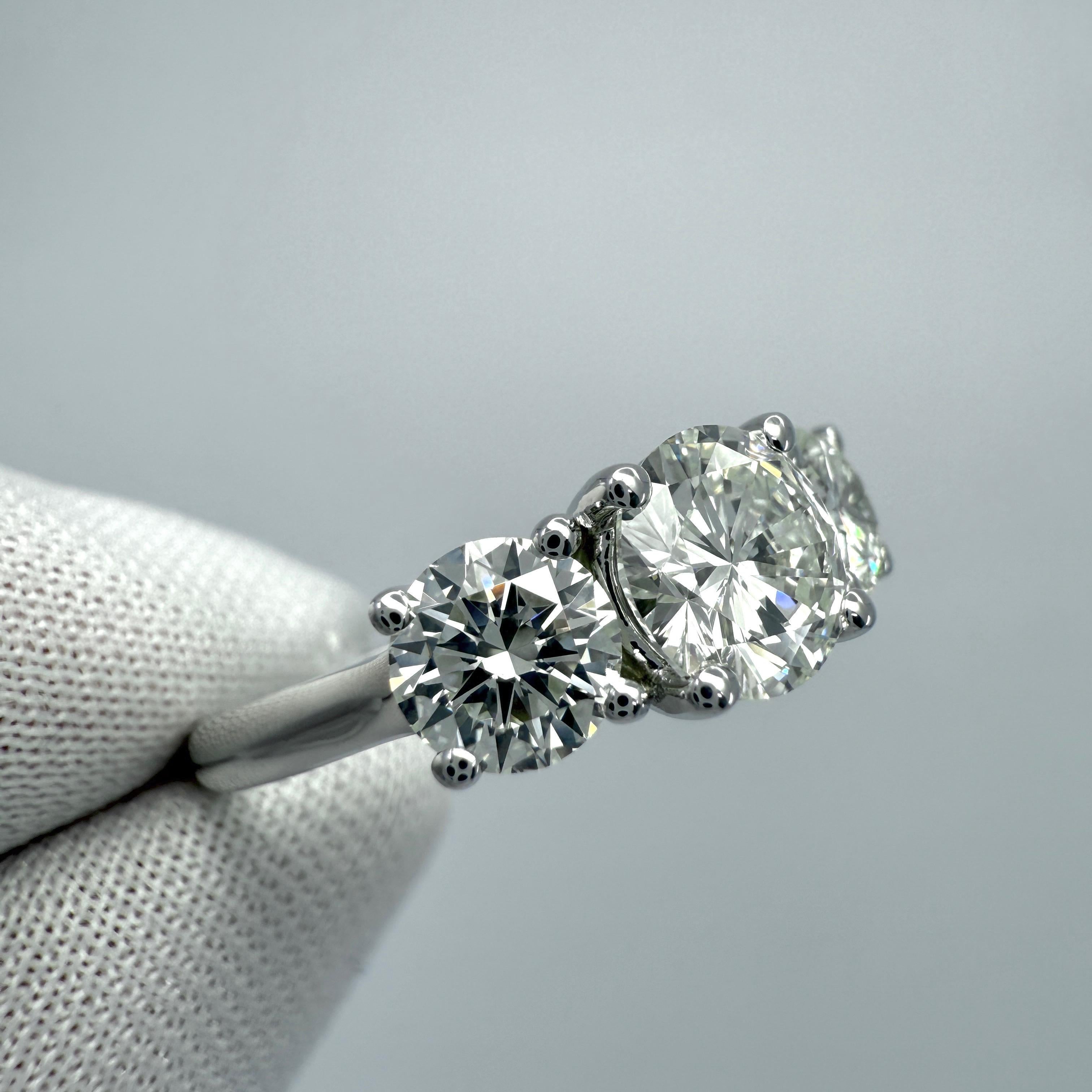 2.07ct GIA Certified Natural Diamond Round VS1 18k White Gold Three Stone Ring For Sale 5