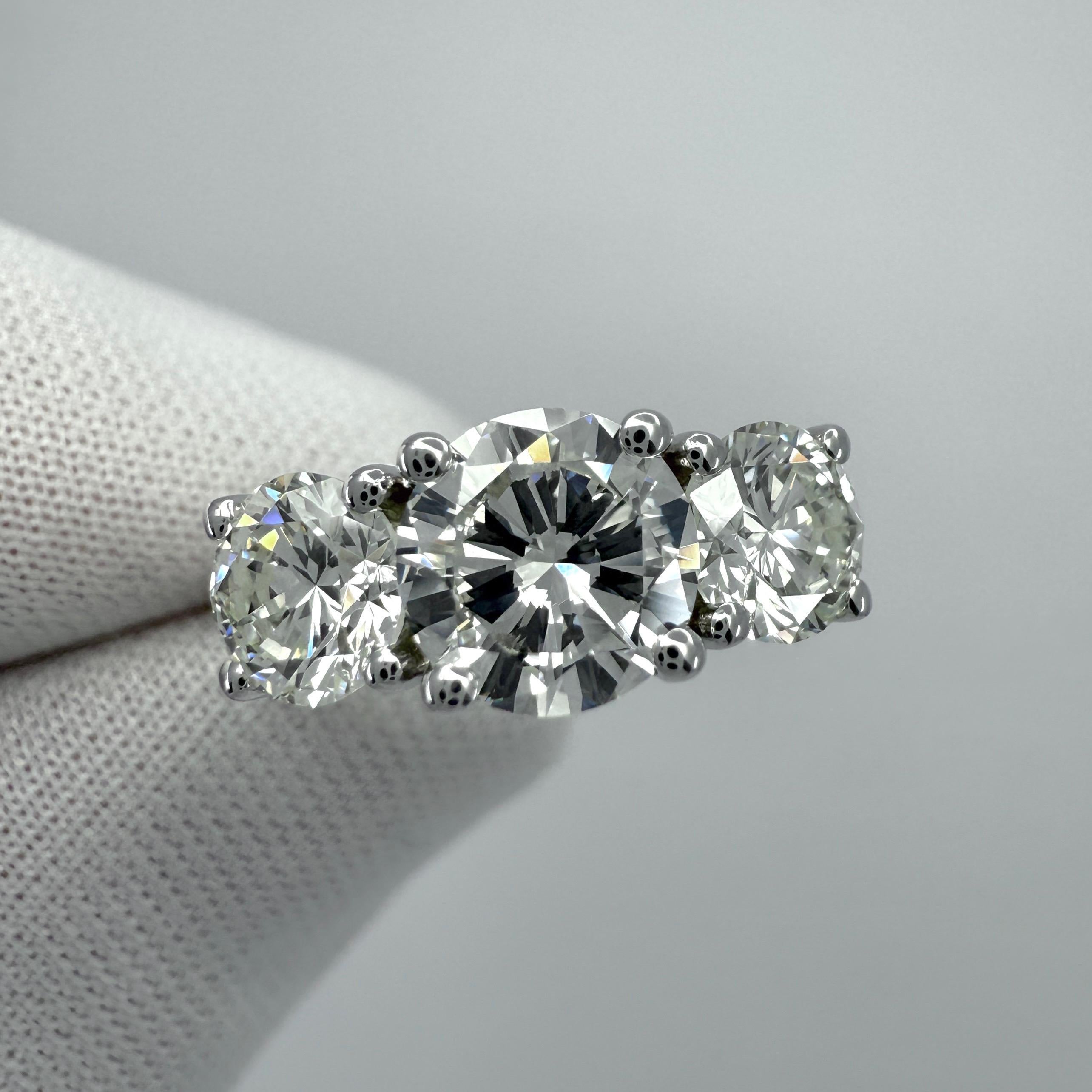 2.07ct GIA Certified Natural Diamond Round VS1 18k White Gold Three Stone Ring For Sale 7