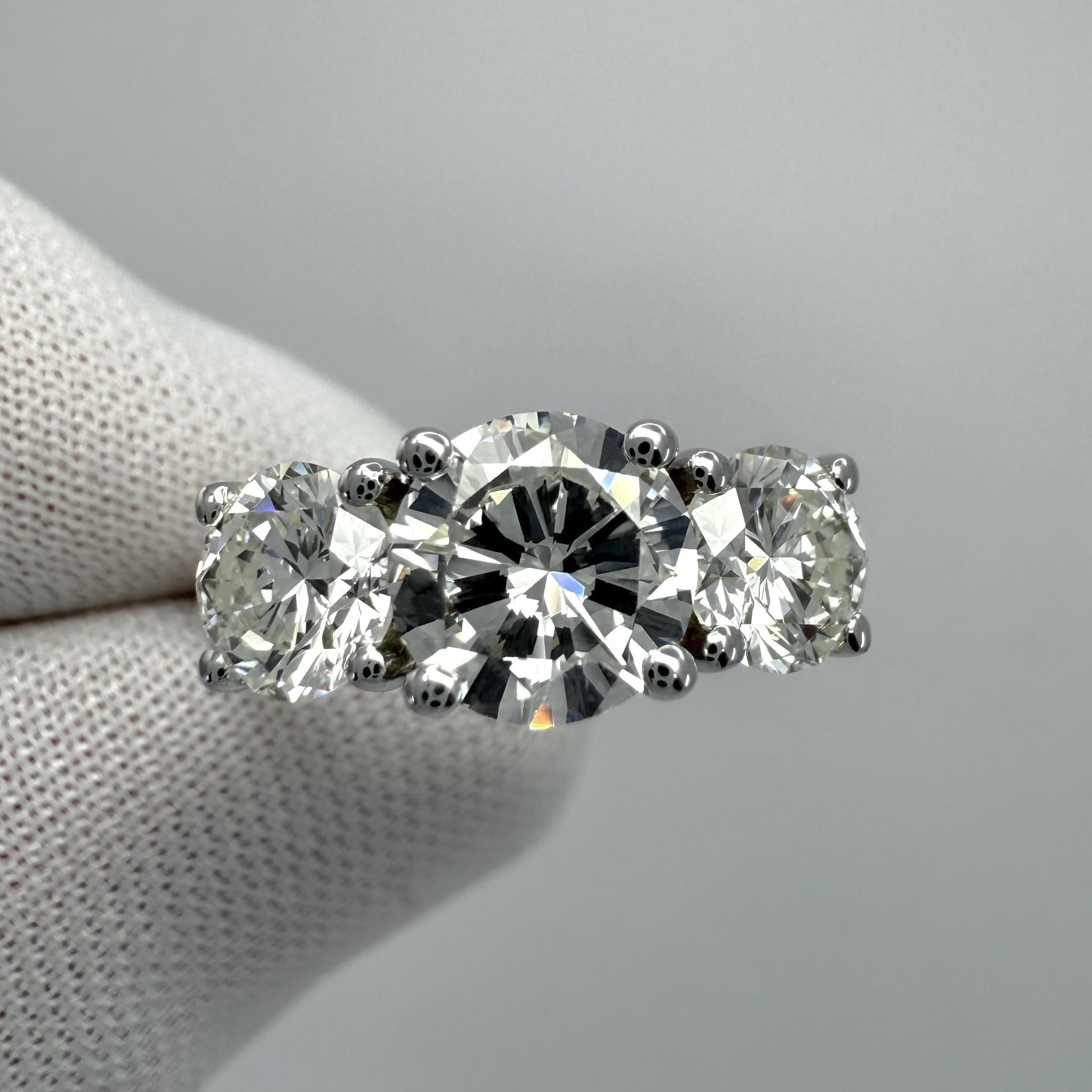 2.07ct GIA Certified Natural Diamond Round VS1 18k White Gold Three Stone Ring For Sale 2