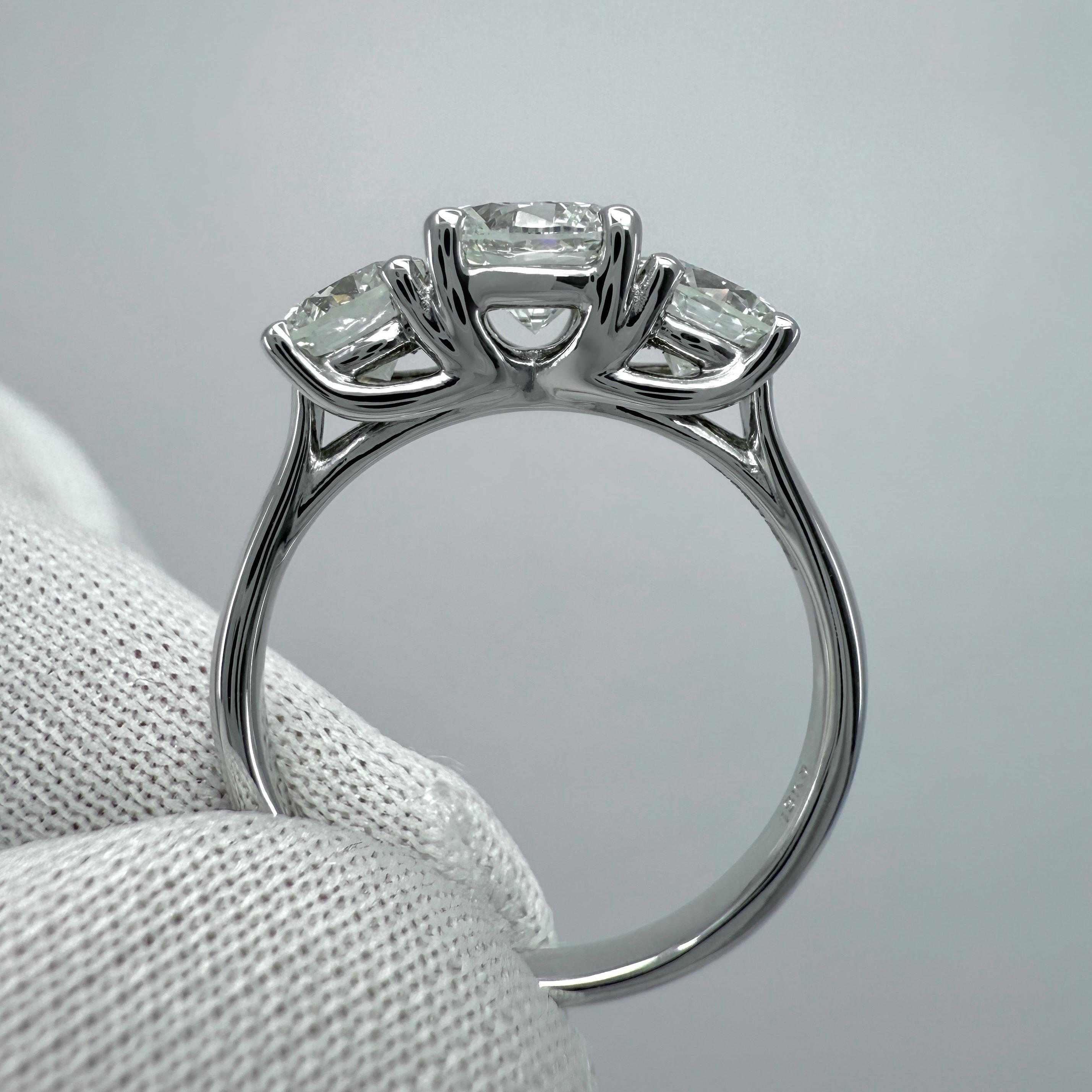 2.07ct GIA Certified Natural Diamond Round VS1 18k White Gold Three Stone Ring For Sale 4