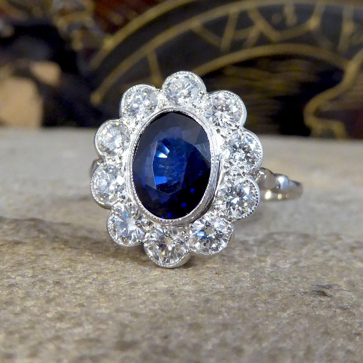 2.07ct Sapphire and 0.95ct Total Diamond Cluster Ring in Platinum In Good Condition In Yorkshire, West Yorkshire