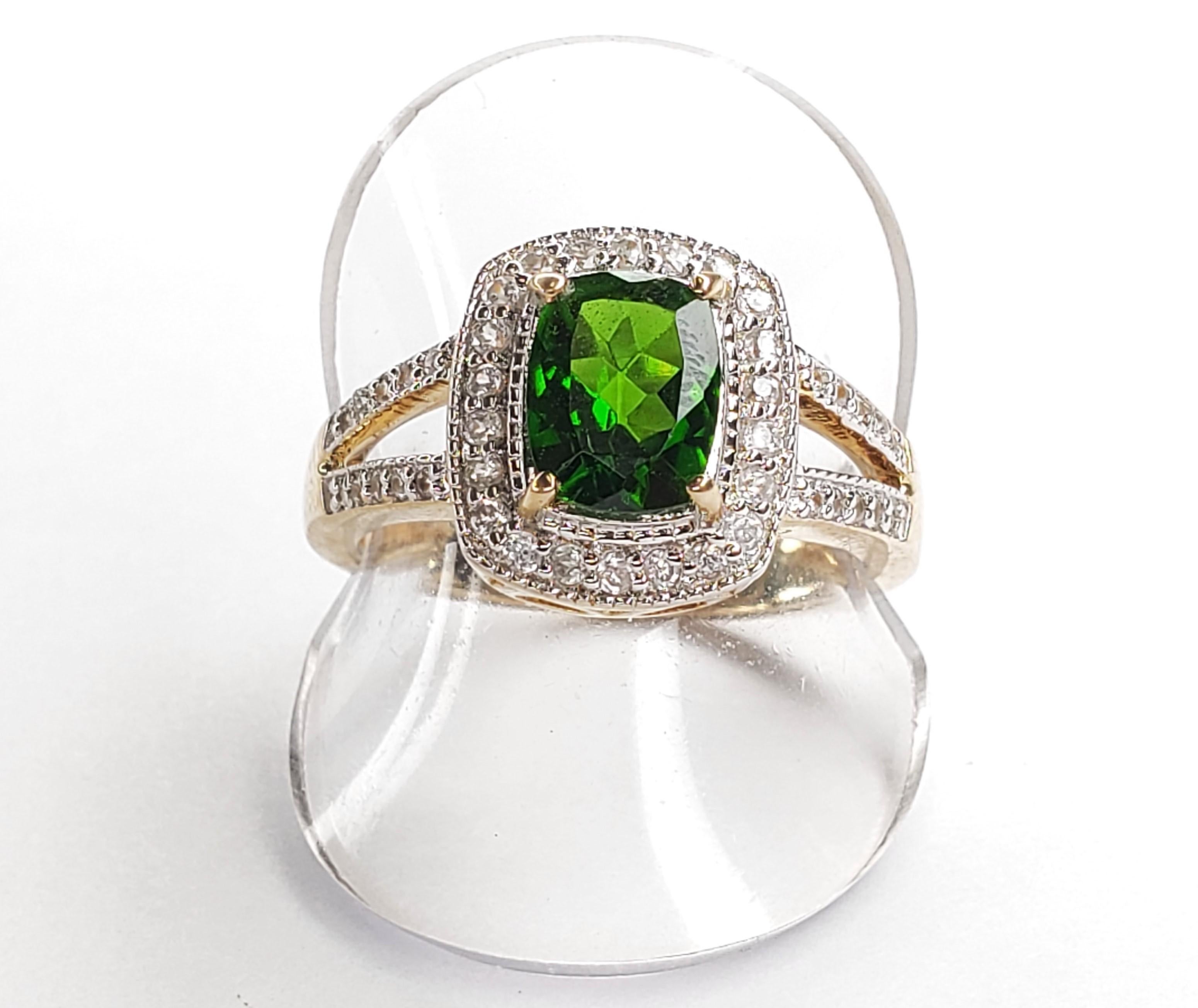 2.07cttw Chrome and White Zircon Sterling Silver Ring - Size 7 

1    Chrome-Diopside Cushion - 1.60cttw
22 Natural White Zircon Round - 0.33cttw
20 Natural White Zircon Round - 0.14cttw 

.925 Sterling Silver w/ 14K Yellow Gold Plated Finish 

US