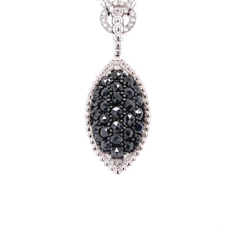 This beautiful necklace has Natural Rose Cut Black Diamonds that weigh 1.78 carats and also Natural Round Cut White Diamonds that weigh 0.30 carats. 
The total carat weight of the necklace is 2.08 carats. 

The necklace is curated in 14 Karat White