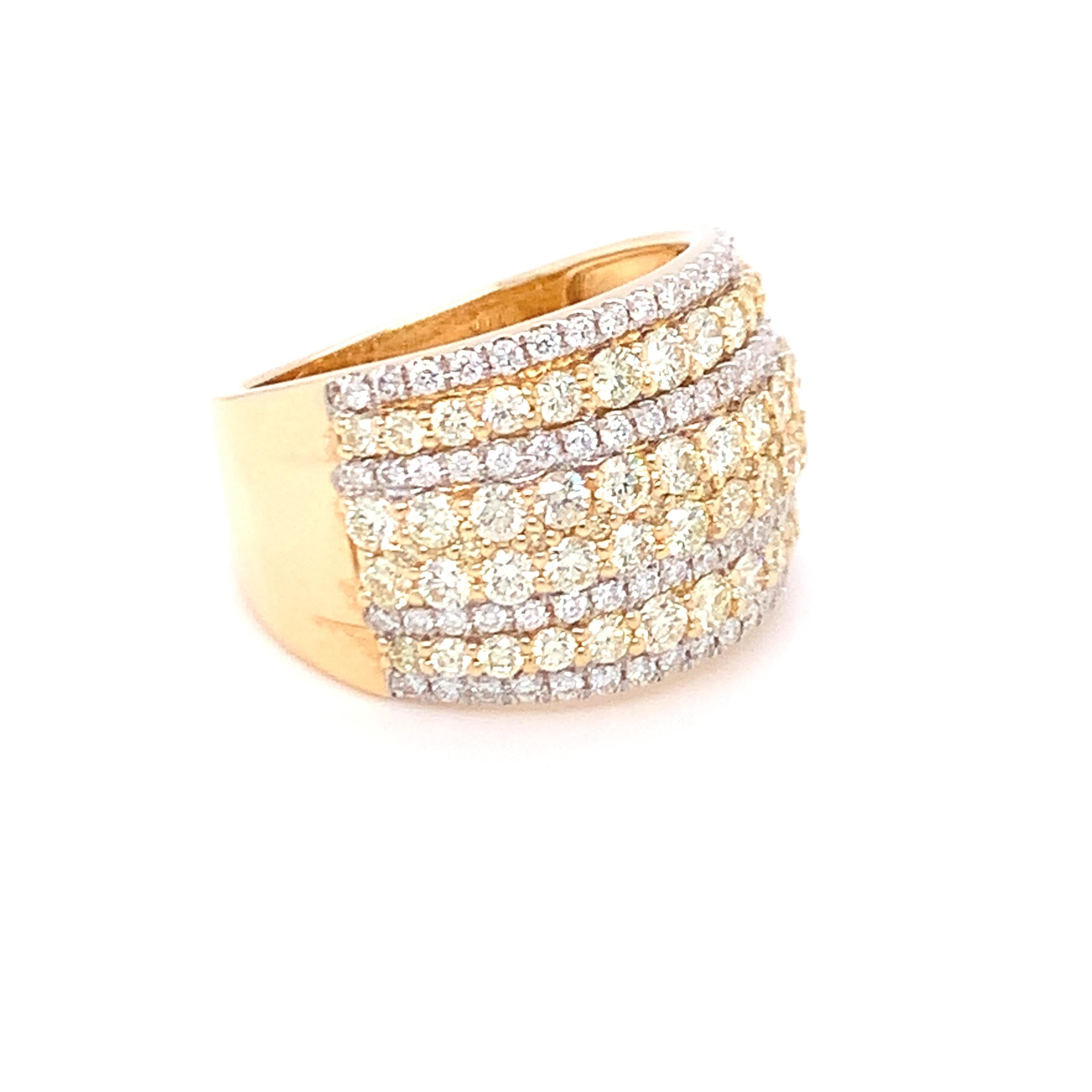 A combination of yellow and white diamond in eight rows makes this band a stunning piece of jewelry. Set in yellow gold and finished with skilled hands.
Yellow Diamond: 1.65ct
White Diamond: 0.43ct
Gold: 14K Yellow
Ring Size:7