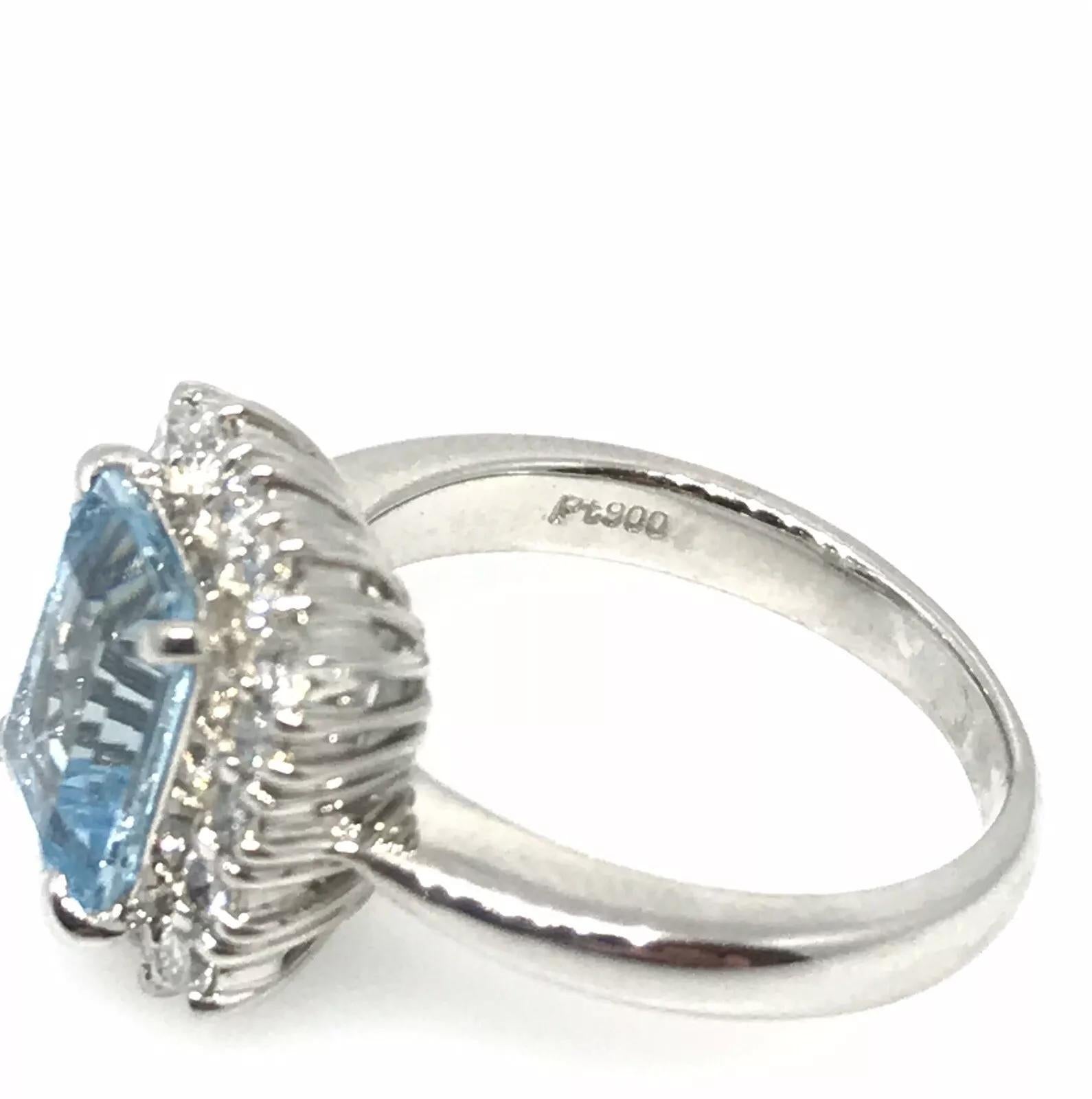 2.08 carat Emerald Cut Aquamarine and Diamond Halo Ring in Platinum 1