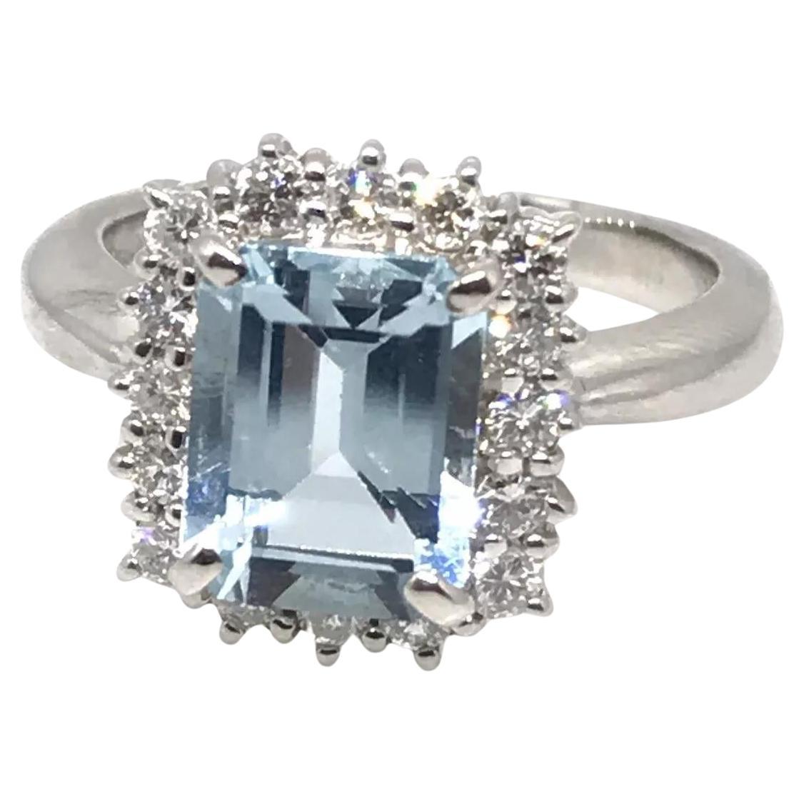 2.08 carat Emerald Cut Aquamarine and Diamond Halo Ring in Platinum