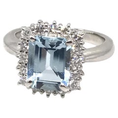 2.08 carat Emerald Cut Aquamarine and Diamond Halo Ring in Platinum