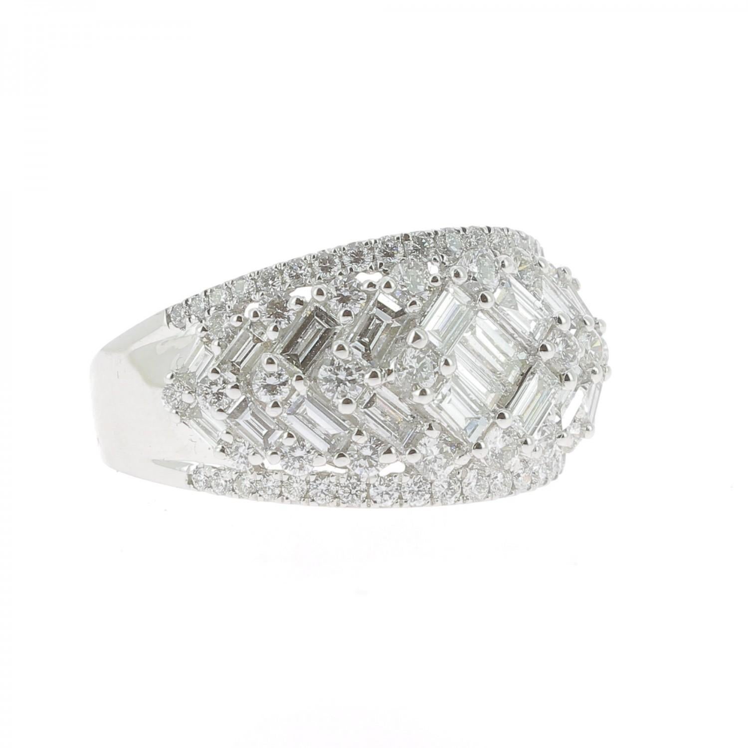 A wonderful Diamond Dome Ring set with Round and Baguettes Diamonds weighing 2.08 Carats. 
The Diamond Dome Ring is set in 18K White Gold, weighing 7.14 Grams
The Cocktail rings is made to order, which means after receiving the order, we will