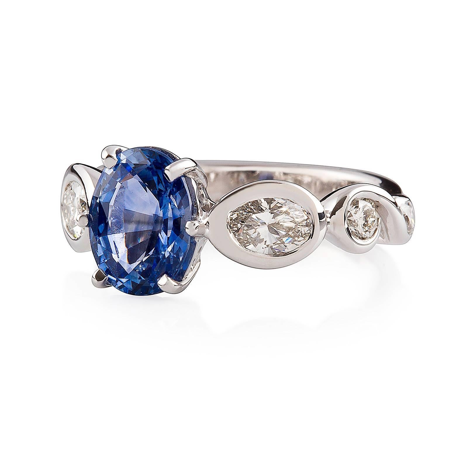 Ceylon Zaffiro Ring

Affording eternal style, this elegant ring is set with a stunning Ceylon sapphire with a pair of individually set diamonds on either side.

Oval faceted sapphire: Medium light strong blue. Eye Clean, Ceylon origin, 8.85 x 6.92 x