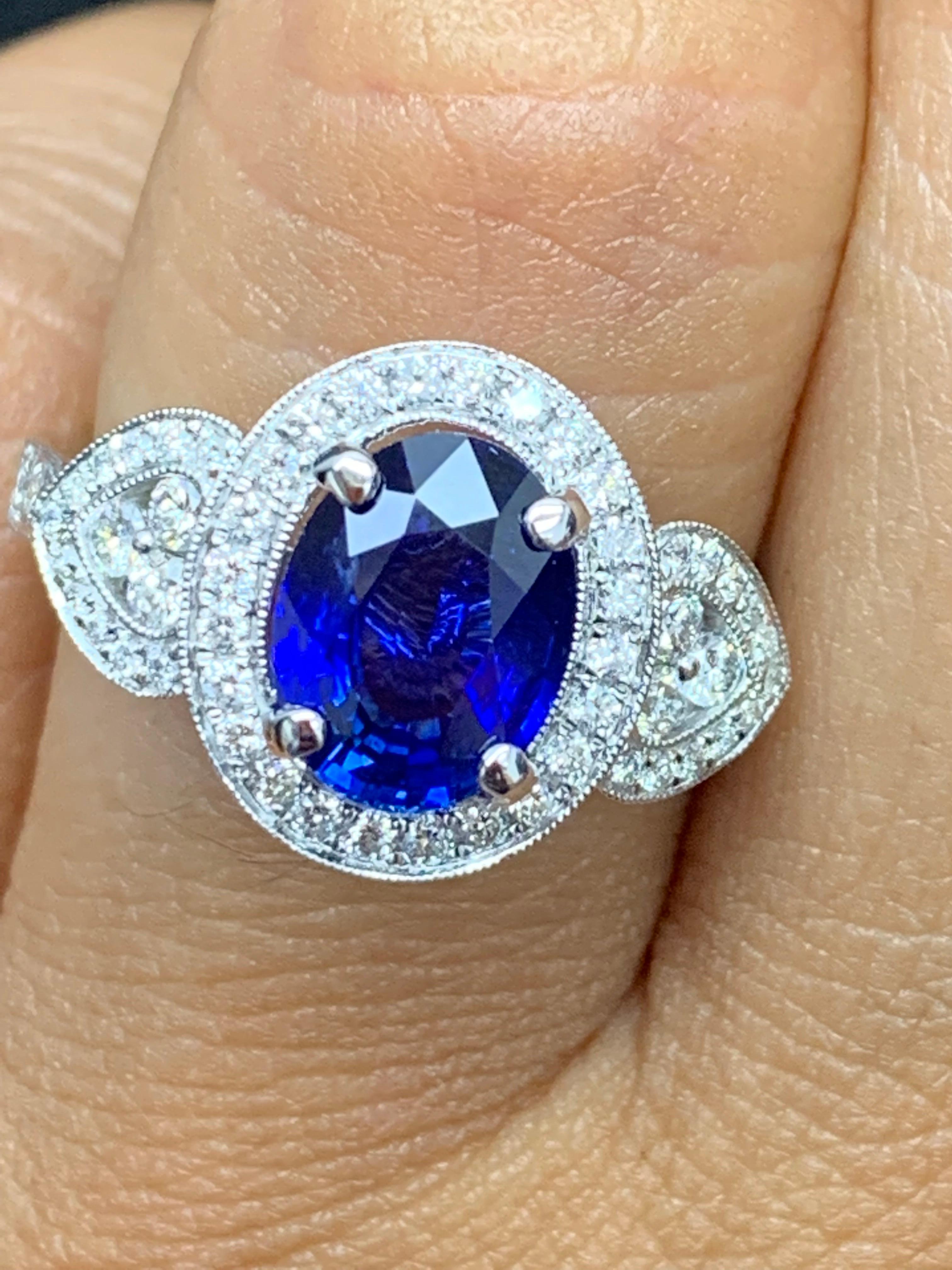 2.08 Carat Oval Cut Sapphire and Diamond Engagement Ring in 18K White Gold For Sale 10