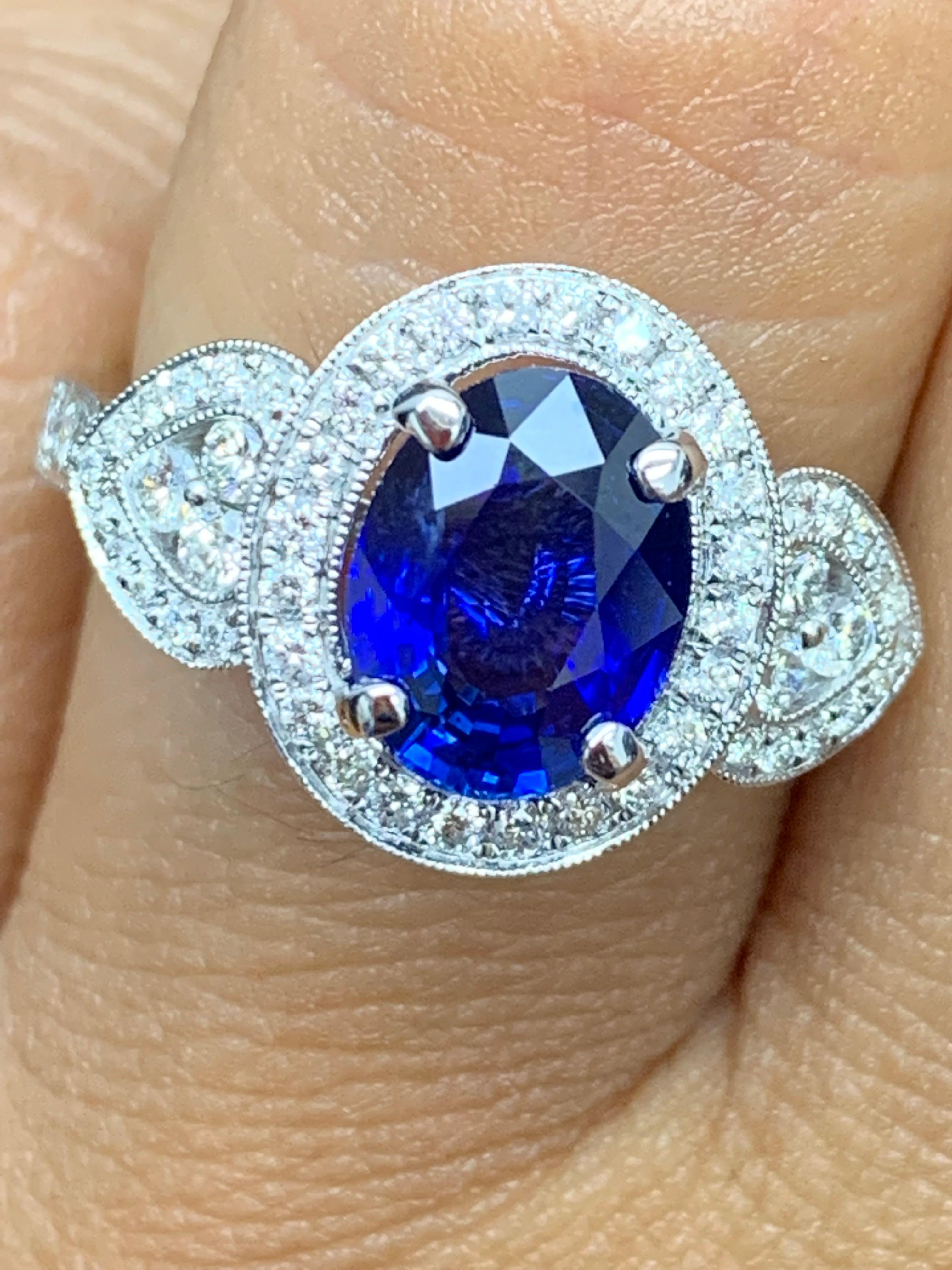 2.08 Carat Oval Cut Sapphire and Diamond Engagement Ring in 18K White Gold For Sale 11