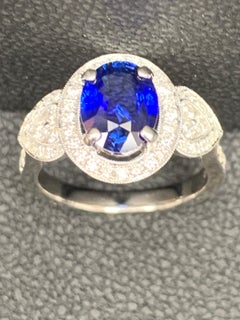 2.08 Carat Oval Cut Sapphire and Diamond Engagement Ring in 18K White Gold