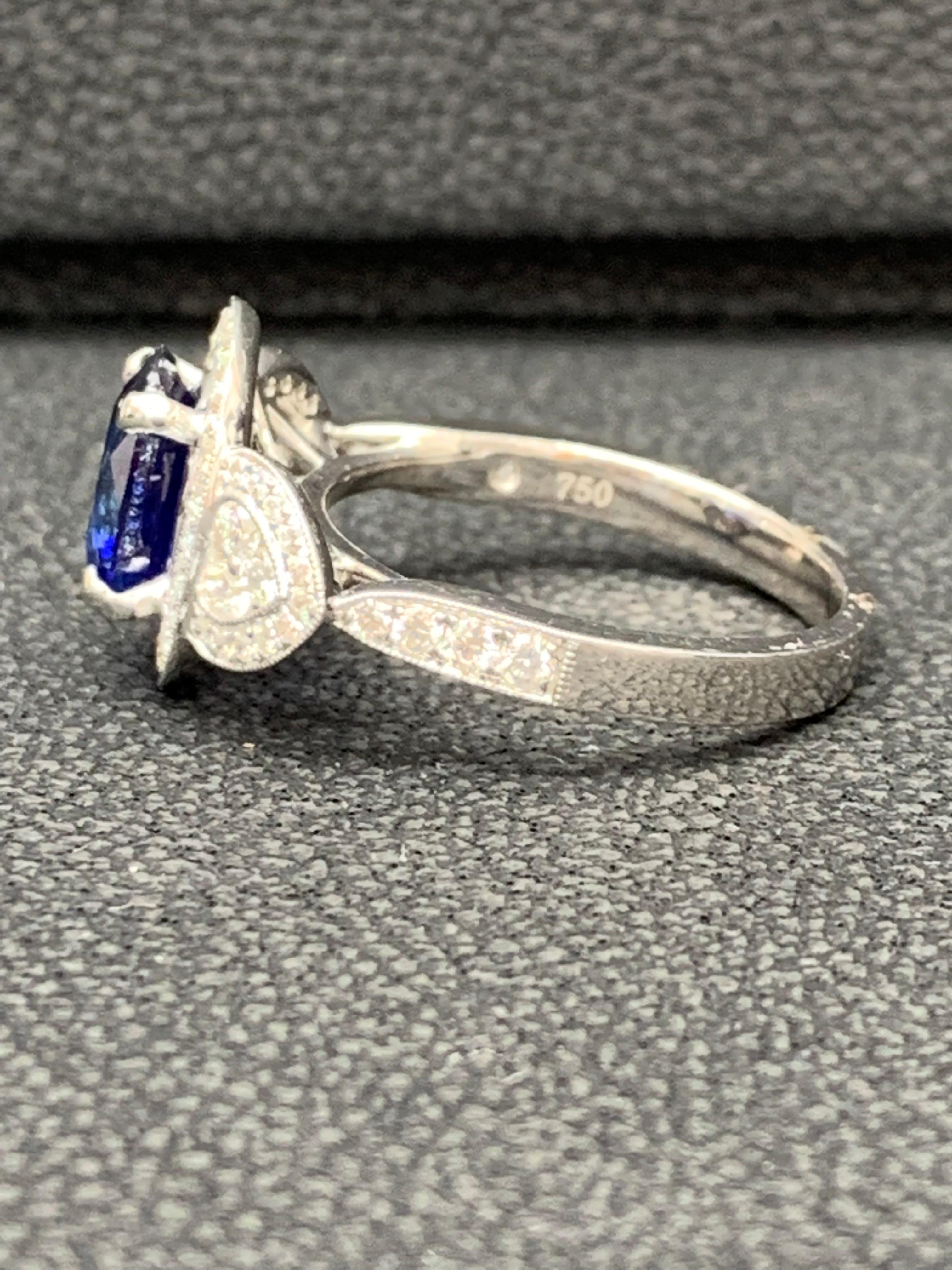 Women's 2.08 Carat Oval Cut Sapphire and Diamond Engagement Ring in 18K White Gold For Sale