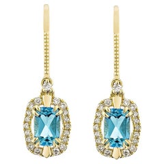 Boucles d'oreilles pendantes en or jaune 14 carats avec diamant et topaze bleue suisse de 2,08 carats.