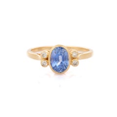 Blue Sapphire and Diamond Wedding Ring in 18K Yellow Gold
