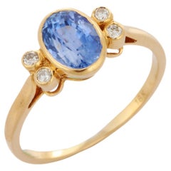 Blue Sapphire and Diamond Wedding Ring in 18K Yellow Gold