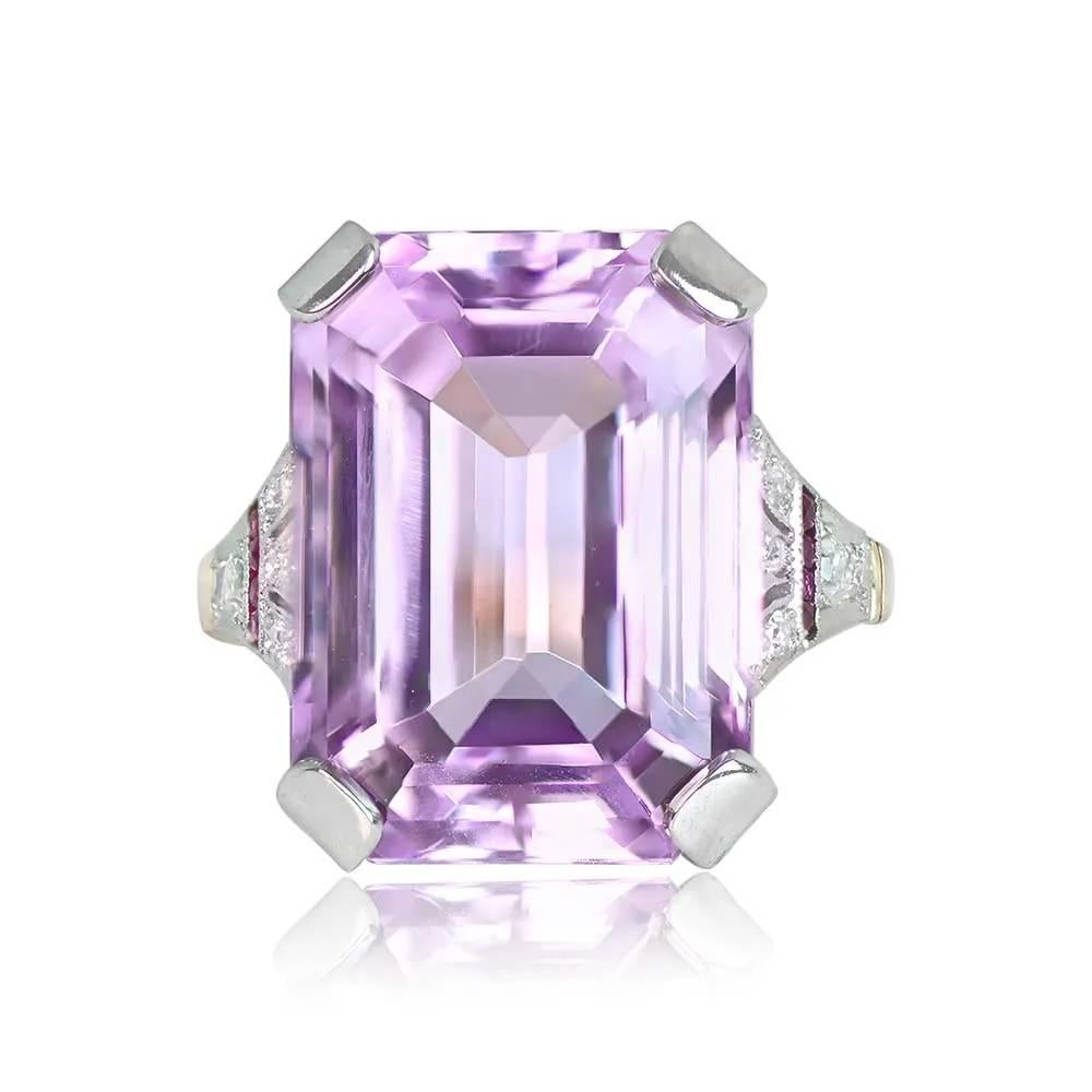 A stunning ring with a 20.82-carat emerald-cut kunzite set in prongs, accentuated by a geometric design of old European cut diamonds and French cut natural rubies on the shoulders. The handcrafted platinum on 18k yellow gold mounting is adorned with