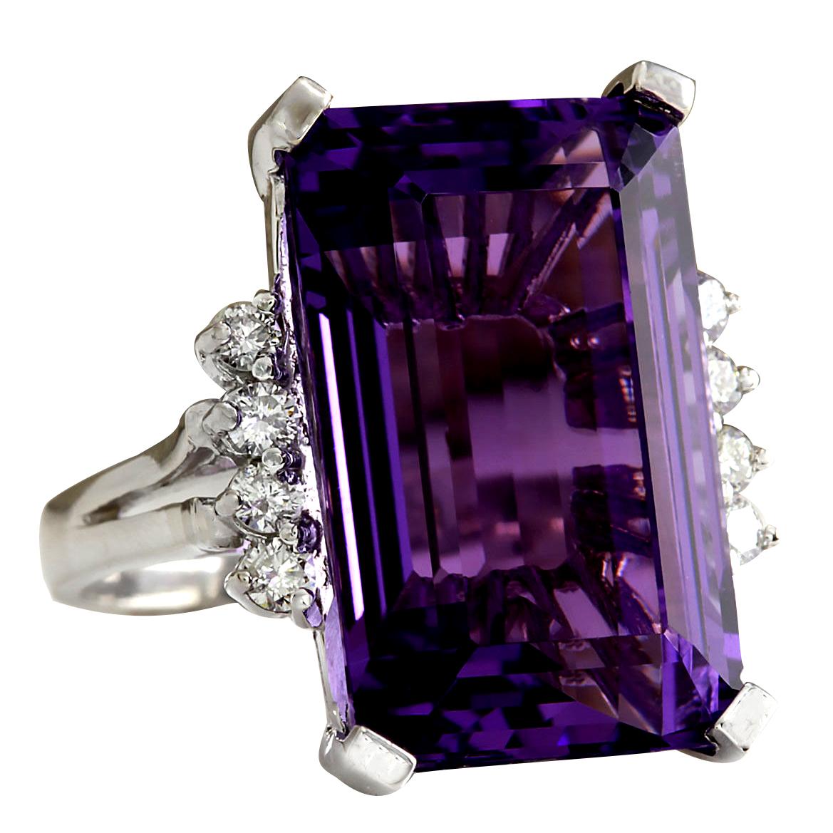 Stamped: 18K White Gold
Total Ring Weight: 7.0 Grams
Ring Length: N/A
Ring Width: N/A
Gemstone Weight: Total Natural Amethyst Weight is 20.55 Carat (Measures: 20.45x13.16 mm)
Color: Purple
Diamond Weight: Total Natural Diamond Weight is 0.30