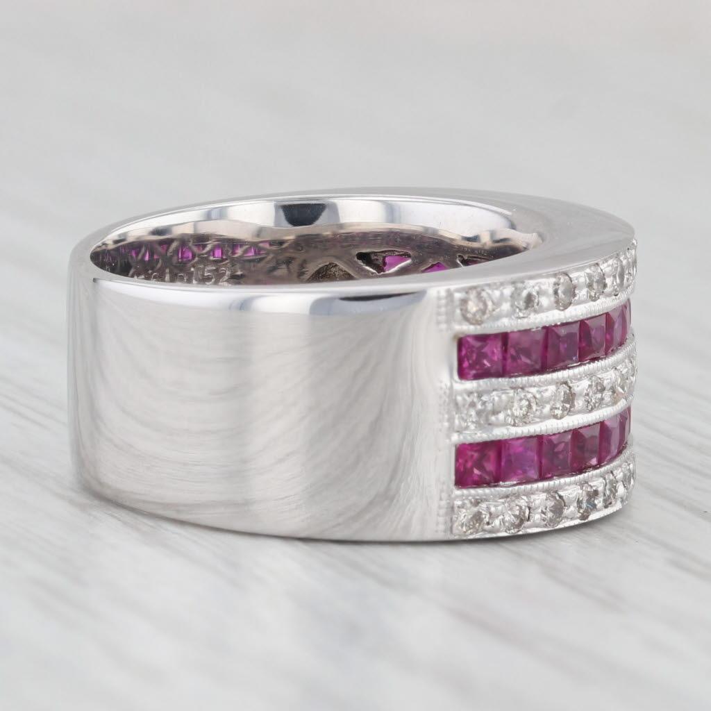 Gemstone Information:
- Natural Diamonds -
Total Carats - 0.56ctw
Cut - Round Brilliant
Color - I - L
Clarity - I2 - I3

- Natural Rubies -
Total Carats - 1.52ctw
Cut - Princess Brilliant
Color - Red
Treatment - Routinely Enhanced 

Metal: 14k White