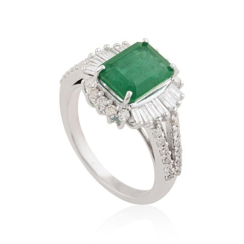 This ring has been meticulously crafted from 10-karat gold.  It is hand set with 2.09 carats emerald & .68 carats of sparkling diamonds. 

The ring is a size 7 and may be resized to larger or smaller upon request. 
FOLLOW  MEGHNA JEWELS storefront