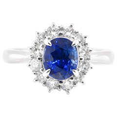 2.09 Carat Natural Blue Sapphire and Diamond Halo Ring Set in Platinum
