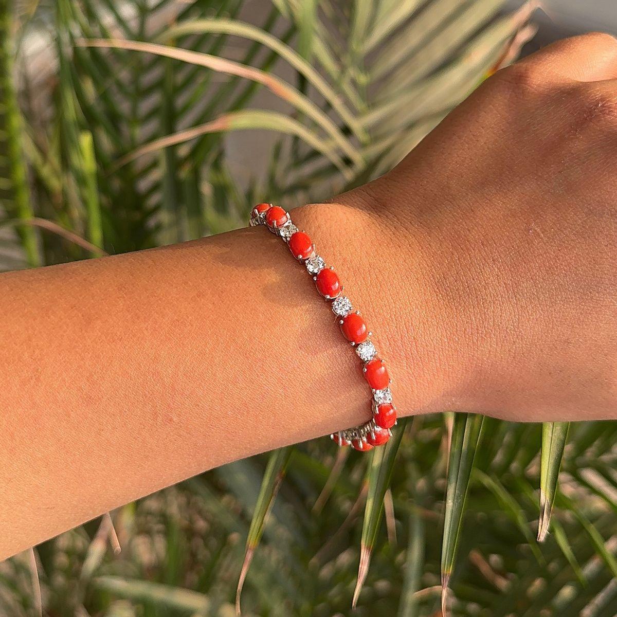Natural Oval Cut Coral with Zirconia 20.9 Carat Tennis Bracelet in sterling silver. You shall need statement tennis bracelet to make a statement with your look. Each piece features dazzling cubic zirconia stones, renowned for their brilliance and