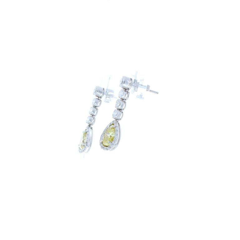 Pear Cut 2.09 Carat Pear Shape Fancy Yellow Diamond Earrings in 18 Karat White Gold