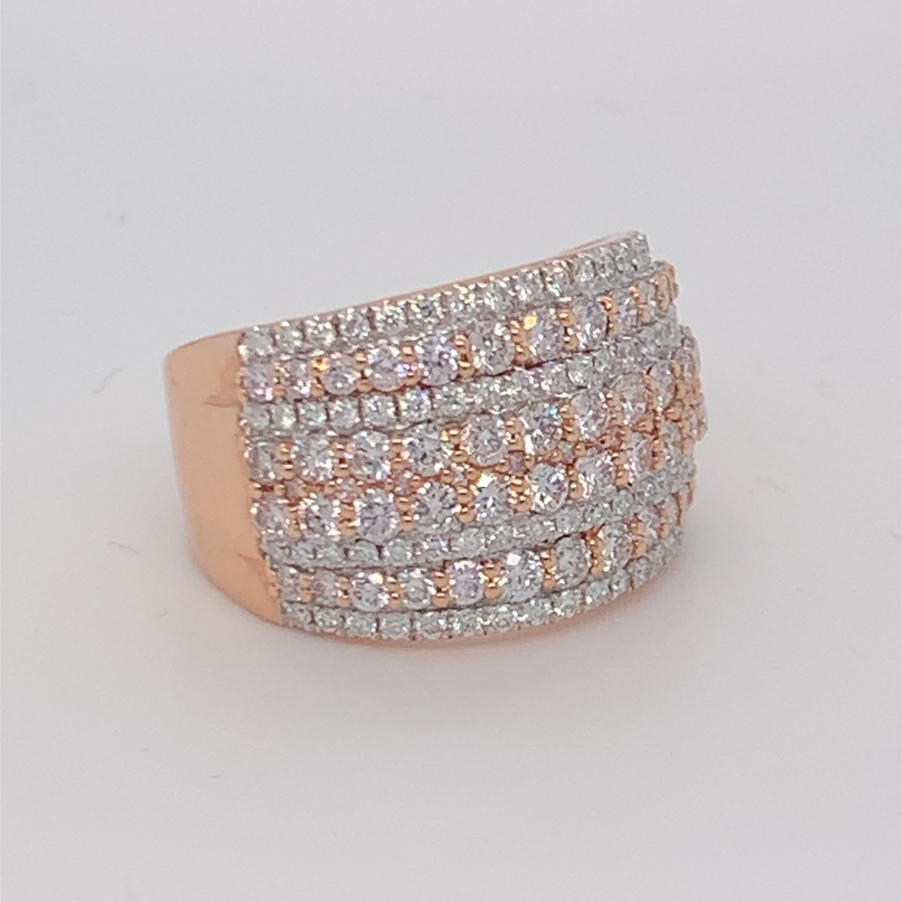 This stunning eight row diamond band has a combination of pink and white diamonds. Carefully finished with hand by skilled craftsmen and mounted in 14K rose gold.  
Pink Diamond: 1.67ct
White Diamond: 0.42ct
Gold: 14K Rose
Size: 7