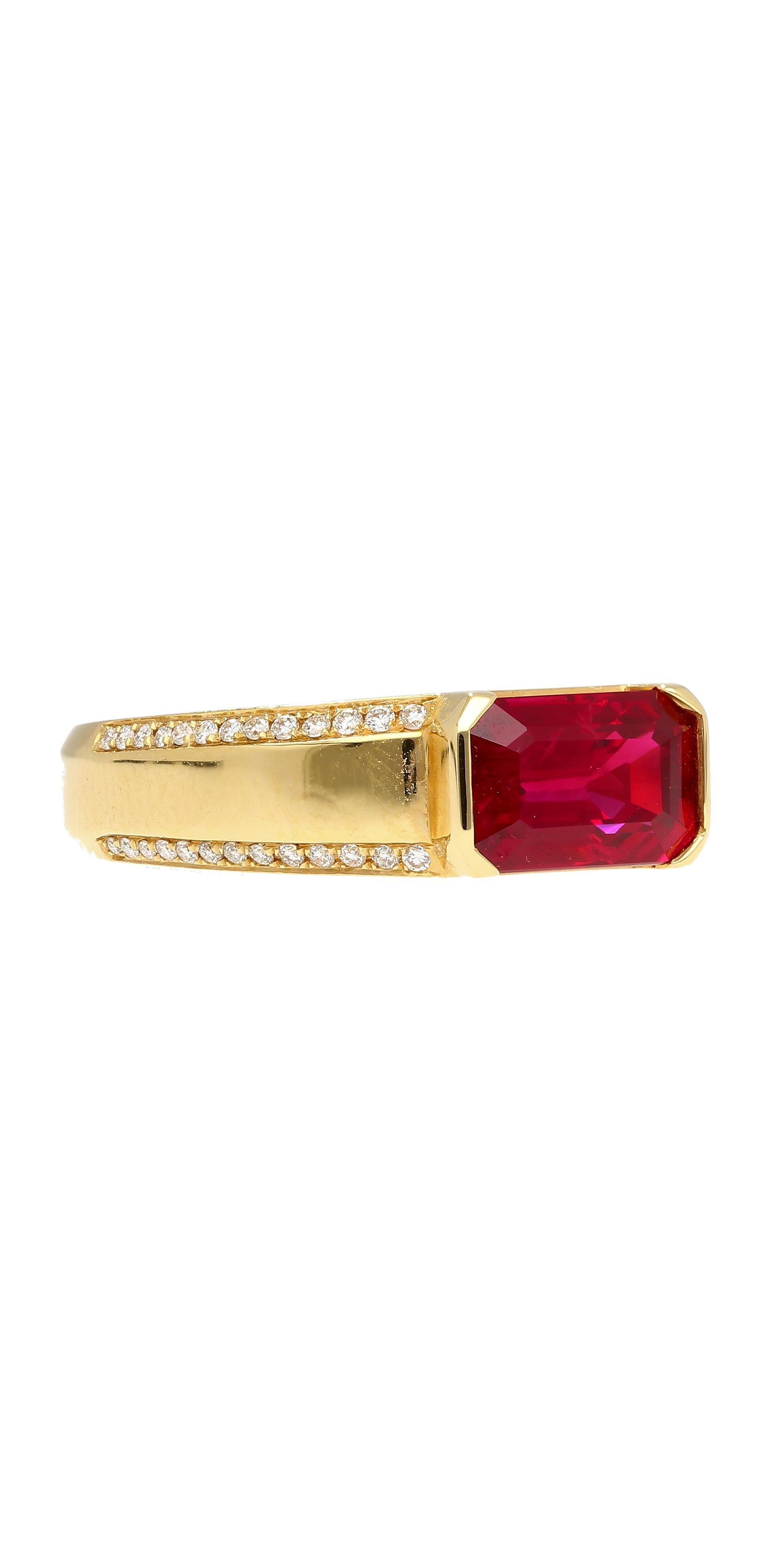 GIA and GRS certified 2.09 Carat Emerald Cut Ruby and Diamond East West Ring in 18K Solid Yellow Gold. 

This important Ruby center stone is a certified Vivid Red Pigeons Blood color. This Burma Ruby exhibits a vivid, bright red hue, closely