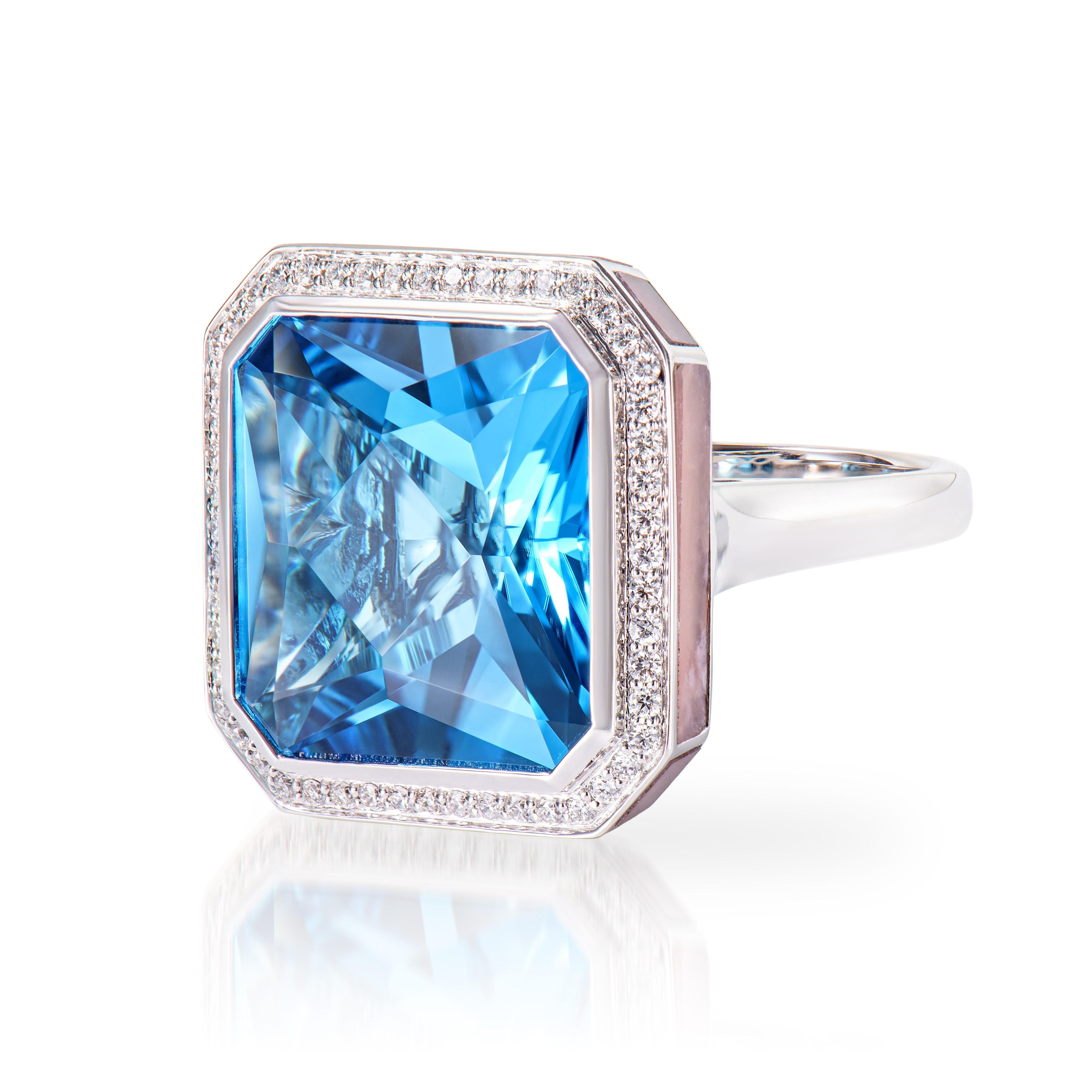 Octagon Cut 20.93 Carat Swiss Blue Topaz Fancy Ring in 18KWG with Opal, Garnet and Diamond. For Sale