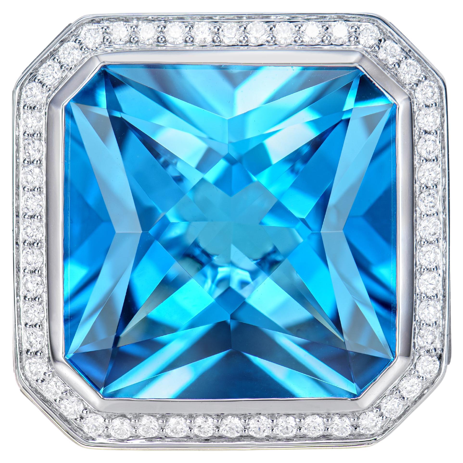 20.93 Carat Swiss Blue Topaz Fancy Ring in 18KWG with Opal, Garnet and Diamond. For Sale