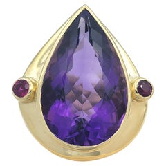 20.98 Carat Pear Cut Amethyst Cocktail Ring with Rubies in 14 Karat Yellow Gold