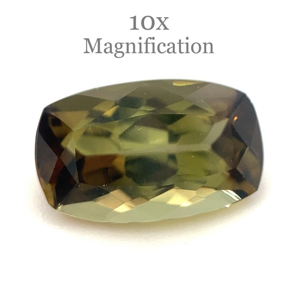 This is a stunning GIA Certified Andalusite

 

The GIA report reads as follows:

GIA Report Number: 6214647347
Shape: Cushion
Cutting Style: Modified Brilliant Cut
Cutting Style: Crown:
Cutting Style: Pavilion:
Transparency: Transparent
Color: