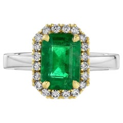 2.09ct emerald-cut Emerald ring in platinum with 18K yellow gold.