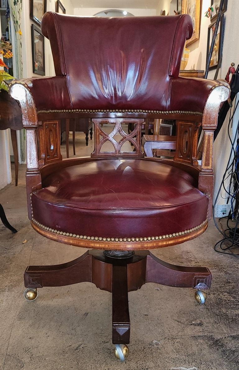 Presenting a lovely 20c burgundy executive swivel chair with beautiful detail.

These chairs were made in the mid to late 20th century. But they are of extremely high quality.

They are in the form of Captain’s or Executive swivel chairs.

We