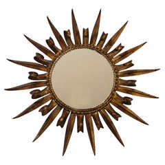 Miroir solaire en fer doré espagnol 20c