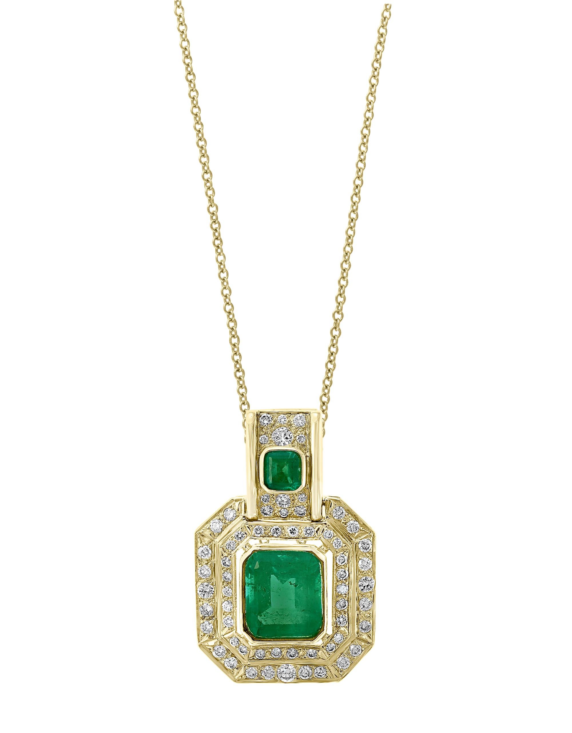 AGL Certified Minor 20 Ct Colombian Emerald & 5 Ct Diamond Pendent/Necklace 14K
20 Carat Colombian Emerald & 5 Ct Diamond Pendent/Necklace 14 Karat Gold Estate
Gold: 14 Karat yellow gold 
Weight: 31 gm  (does not include weight of the chain)
