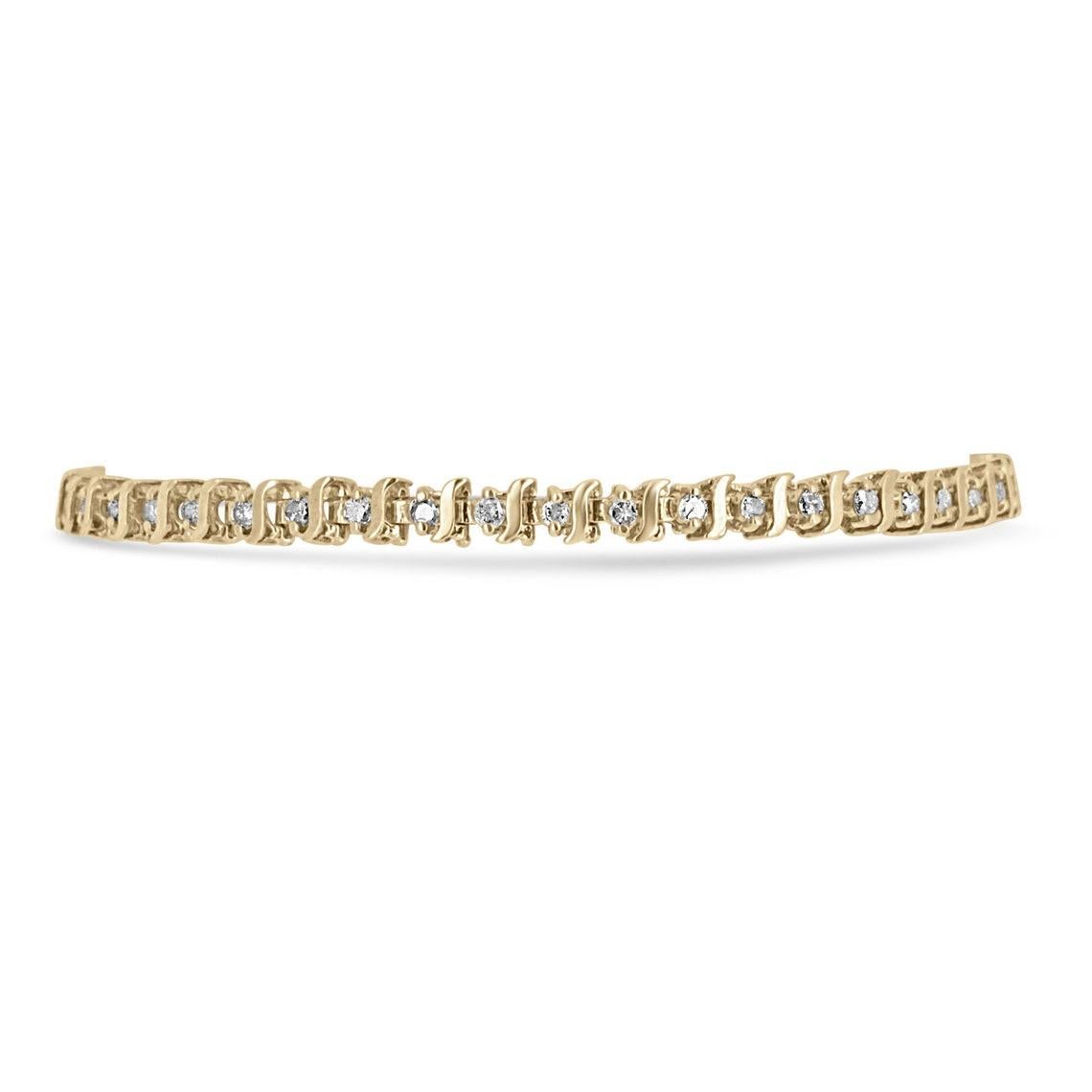 Le bracelet classique en or jaune présente une rangée continue de diamants. Des diamants de taille brillante alternent harmonieusement avec d'élégants maillons en S dans un sertissage en or jaune 14K. 2,0 carats de diamants étincelants rehaussent le