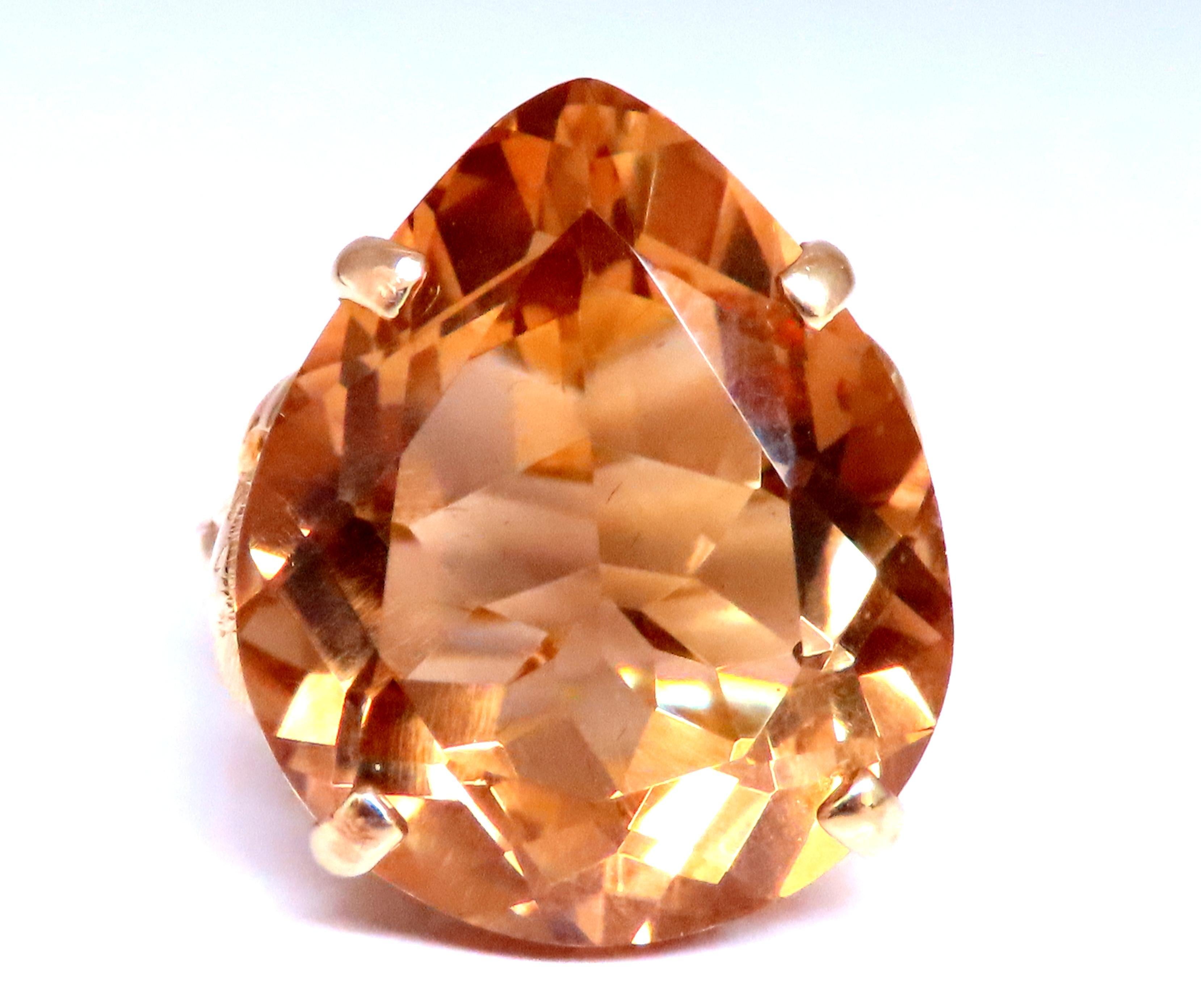 Victorian Solitaire Style Ring

20.30ct Natural Citrine
Pear Shaped Clean Clarity
21 x 17mm
Golden Yellow Color.

18kt Yellow Gold
10.3 grams.
Depth Of ring: 10mm
Ring Size: 5.5