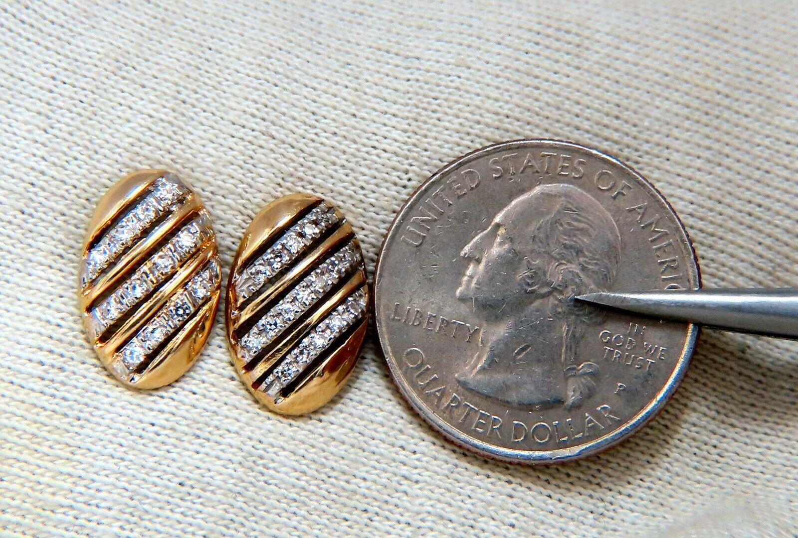 Oval Striped 

.20ct. Natural diamonds  

Rounds, Full cut brilliants.

H- color Vs-2 Clarity. 

Excellent detail.

14kt. yellow gold

3.7 grams.

.65 inch long

.41  inch long
