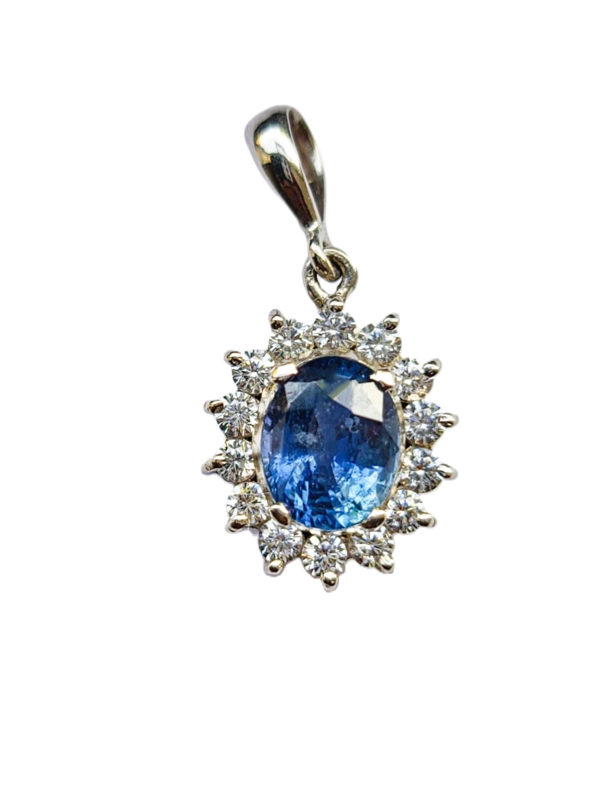 Enjoy this breathtaking 2ct Oval Natural Blue Sapphire Platinum Silver Bezel Necklace Pendant, a radiant masterpiece that exudes timeless elegance and charm. This pendant is a true embodiment of sophistication and grace, perfect for adding a touch