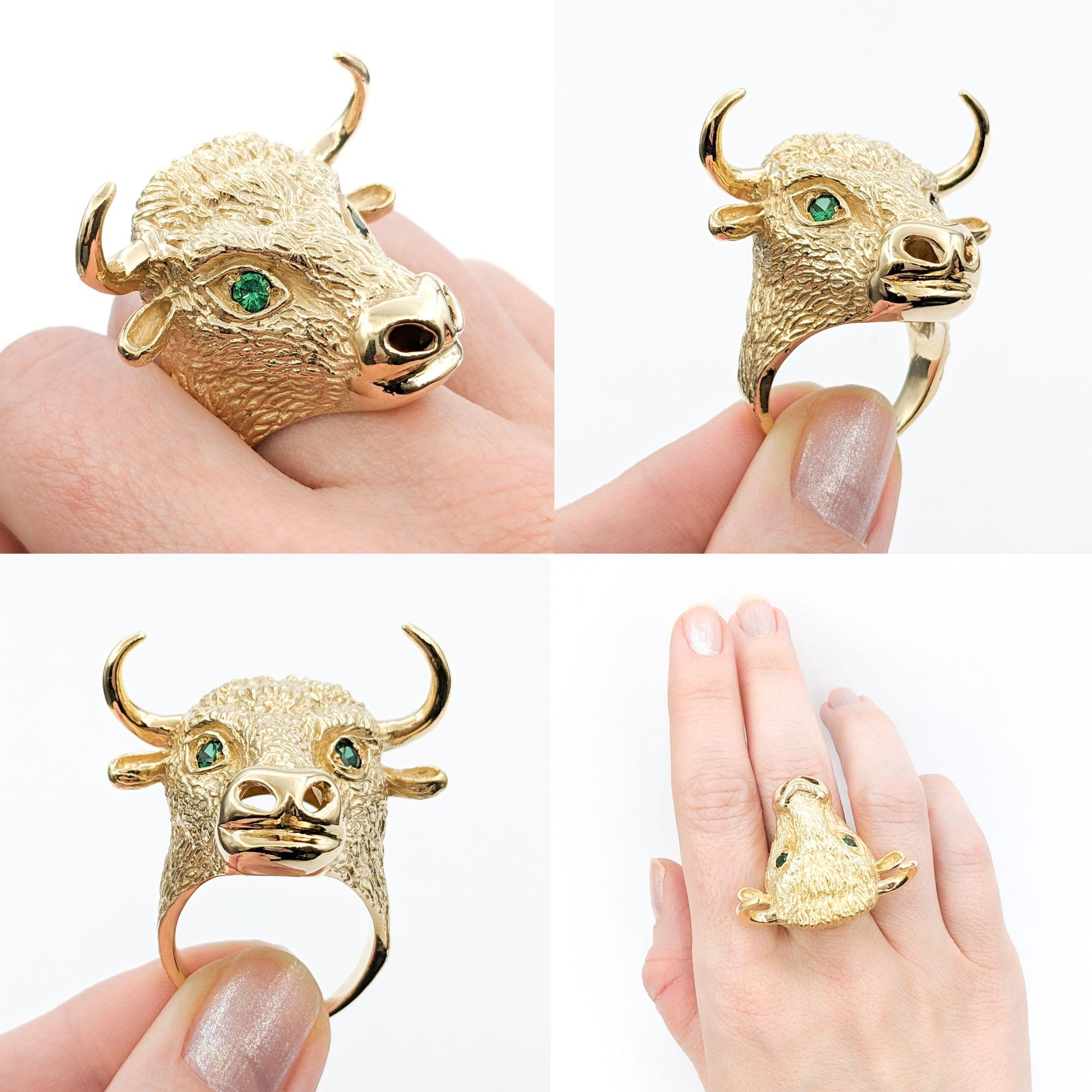 .20ctw Emerald Bull Head with Horns Custom Design Ring In Yellow Gold


This unique and striking ring is expertly crafted in 14kt yellow gold, featuring a .20ctw round emerald centerpiece. The design takes inspiration from a bull's head with horns,