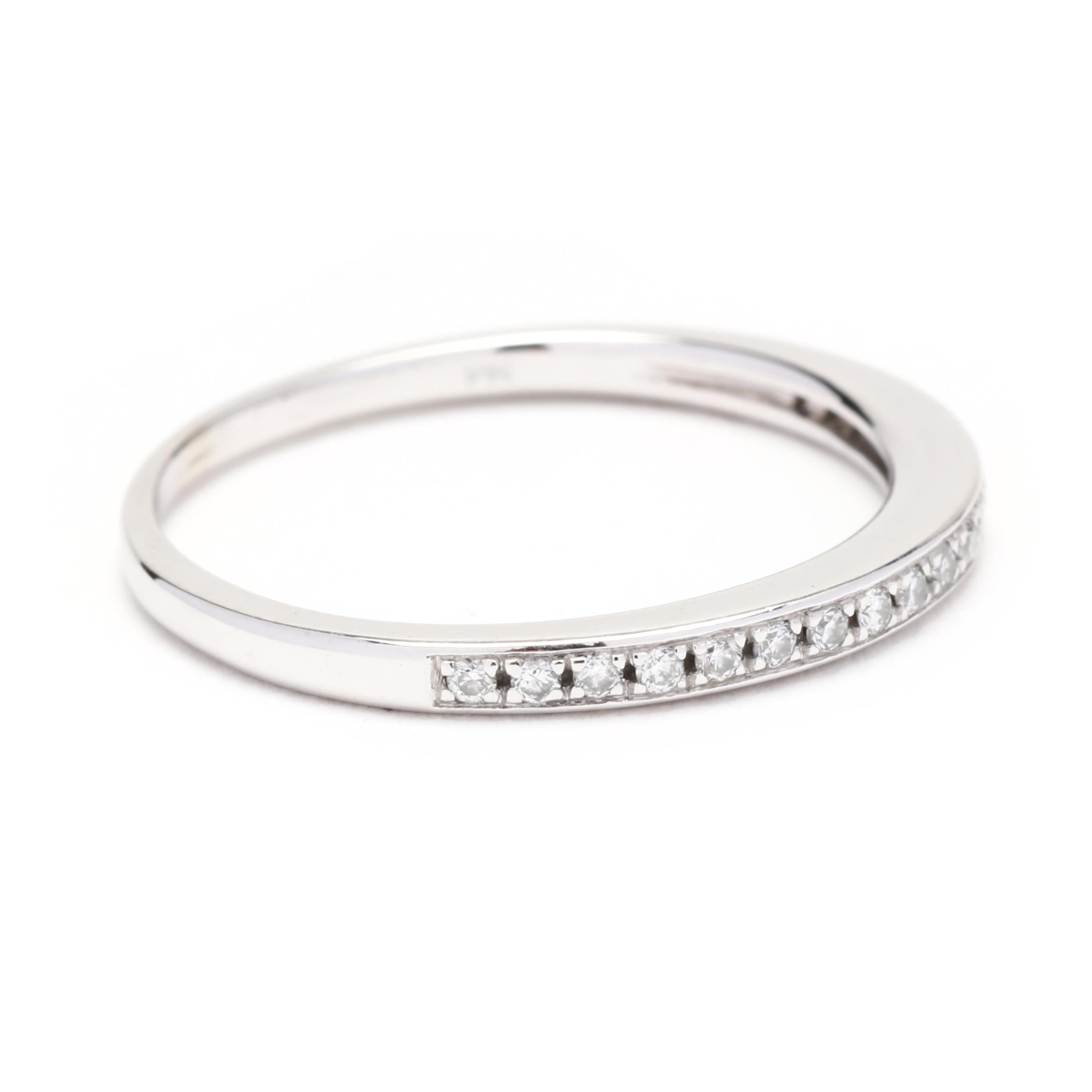 This elegant 0.20ctw thin diamond wedding band is a perfect addition to your wedding day. Crafted in 14K white gold, this thin stackable diamond ring will last a lifetime. Featuring 0.20 carats of diamonds in a petite row of sparkle, this ring is
