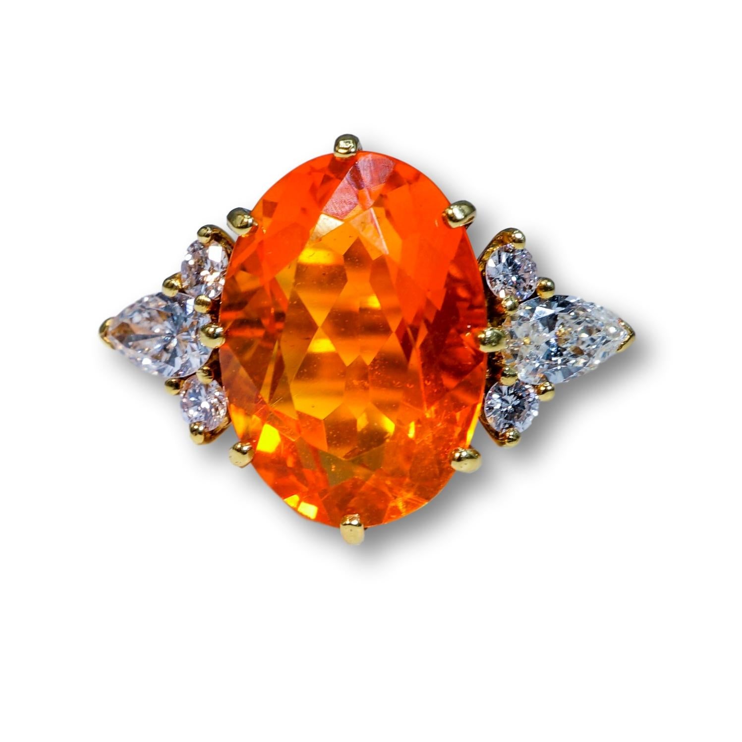This 20K Imperial Topaz Ring is of Contemporary Design, and features white clean diamonds on either side of the Topaz Stone.